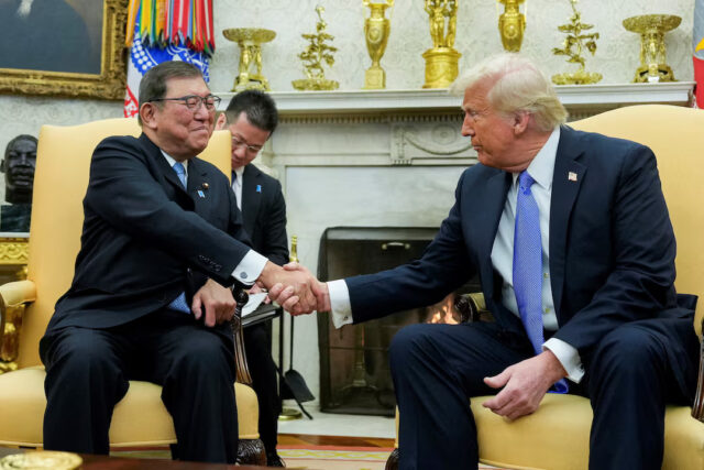 US President Donald Trump shakes hands with Japan's Prime Minister Shigeru Ishiba at the White House in Washington, US, February 7, 2025. REUTERS/Kent Nishimura/File Photo