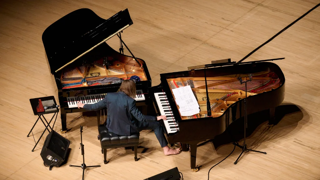 Photo from above showing the conventional and the decaphonic pianos on stage