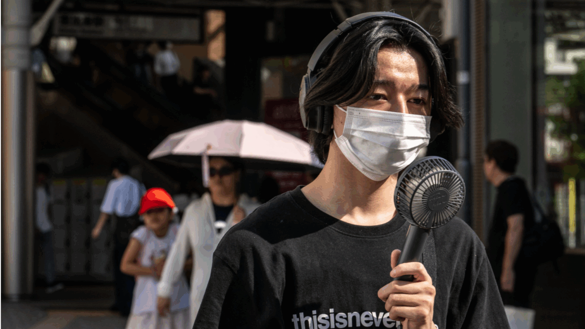 Protect workers from heat waves or face fines, Japan tells firms