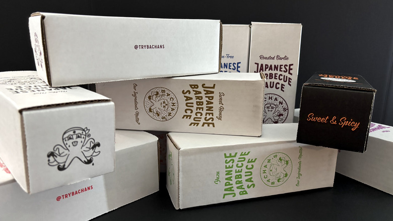 Various Bachan's Japanese Sauce boxes on black background