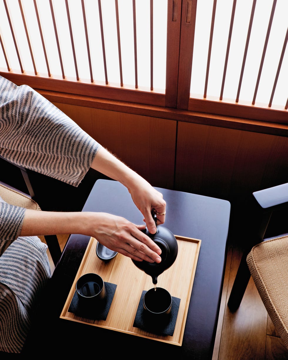 tea preparation and serving in a traditional setting