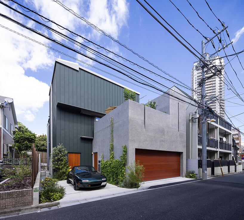 semicircular skylights cast sunbeams across takeshi hosaka's concrete residence in tokyo