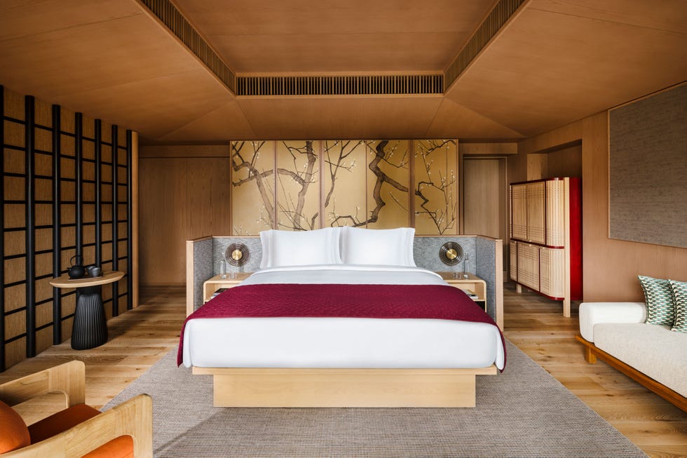 the bedroom of a hotel in japan