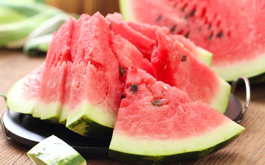 Slices of watermelon on the table in summertime