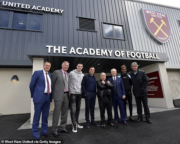 Former West Ham academy manager Terry Westley (furthest left) was drafted in alongside head of academy operations Adam Raines to lead a revolution in Japan