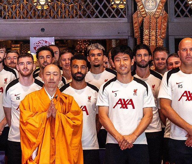 Luis Diaz (middle) was pictured with his soon-to-be former team-mates at the temple on Monday morning