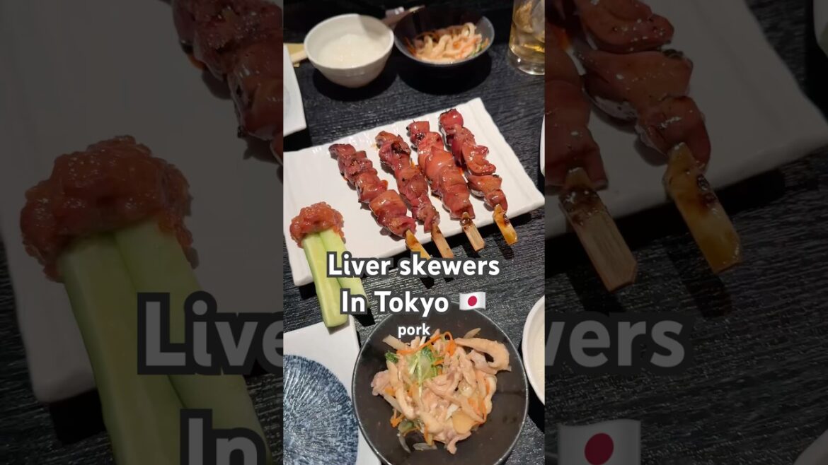 I tried liver skewers at a train station in Tokyo Japan