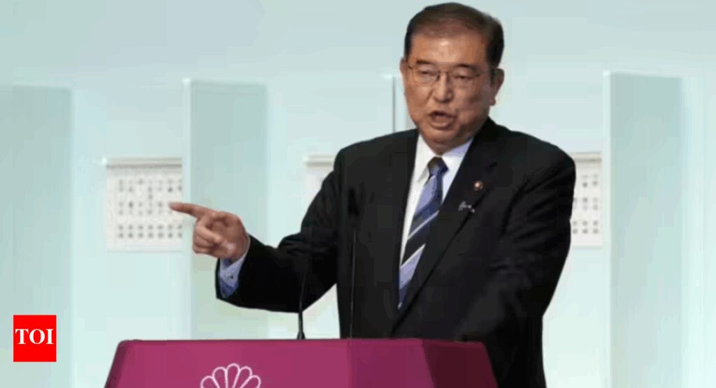 Japan PM hangs on after election debacle