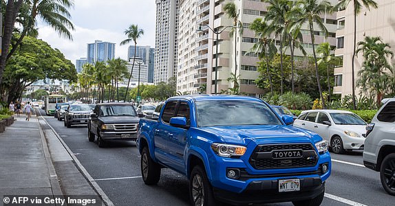 Vehicles depart Waikiki beach in Oahu, Hawaii on July 29, 2025, after an 8.7 earthquake off of Russia's far east prompted tsunami alerts. A powerful 8.7 magnitude earthquake off Russia's far east has prompted tsunami alerts across parts of the Pacific including Japan, Hawaii, Russia and Ecuador, and warnings along the California coast, US authorities said late on July 29. The massive temblor triggered warnings of waves up to three metres (10 feet) possibly hitting the coasts of Russia, Hawaii and even Ecuador and Chile along South America's west coast, according to the US Pacific Tsunami Warning Center based in Honolulu, Hawaii. (Photo by Eugene Tanner / AFP) (Photo by EUGENE TANNER/AFP via Getty Images)