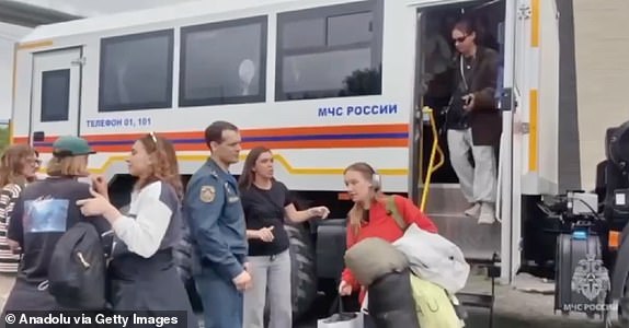 SAKHALIN OBLAST, RUSSIA - JULY 30: (----EDITORIAL USE ONLY  MANDATORY CREDIT - 'RUSSIAN MINISTRY OF EMERGENCY SITUATIONS/ HANDOUT' - NO MARKETING NO ADVERTISING CAMPAIGNS - DISTRIBUTED AS A SERVICE TO CLIENTS----) A screen grab from a video shows people being evacuated after magnitude 8.8 earthquake hits Kamchatka Peninsula and a tsunami partially flooded the area, including the grounds of the Alaid fishing enterprise, on July 30, 2025 in Sakhalin Oblast, Russia. The evacuation was carried out under the supervision of Russia's Ministry of Emergency Situations in the Sakhalin Region. In Kamchatka, about 60 vacationers were evacuated from Khalaktyrsky Beach with the help of three cross-country vehicles. No significant rise in water levels was recorded in nearby settlements. Civilians evacuated from the port of Severo-Kurilsk after a tsunami partially flooded the area. (Photo by Russia Min. of Emergency Situations / Handout/Anadolu via Getty Images)