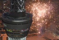 Fireworks are seen near Tokyo Skytree, left, during the Sumida River Fireworks Festival in Tokyo on July 26, 2025, in this photo taken from a Mainichi Shimbun helicopter. (Mainichi/Koichiro Tezuka) 