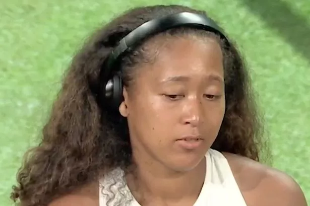 Naomi Osaka speaking to media