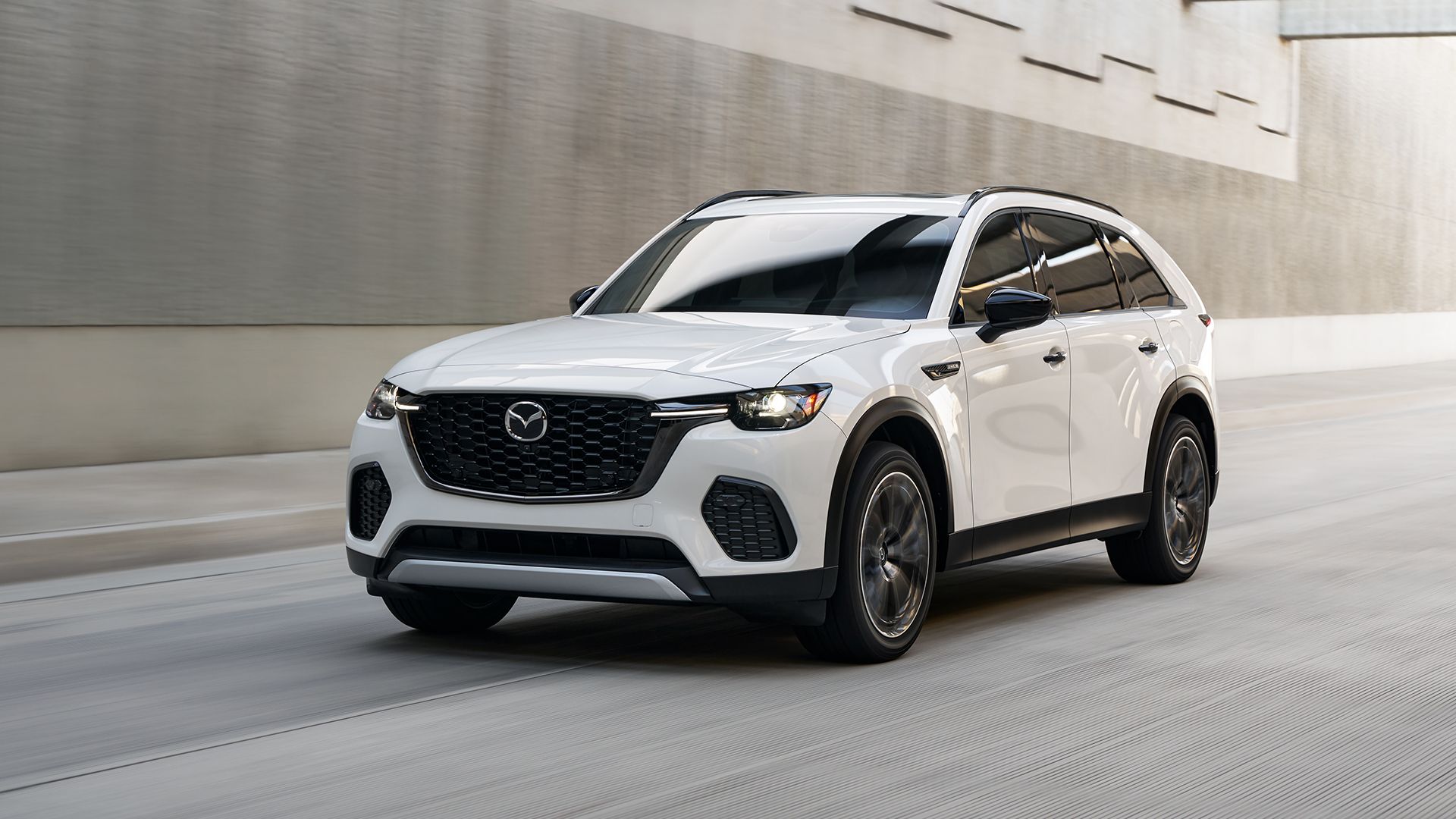 Front dynamic shot of the 2025 Mazda CX-70 