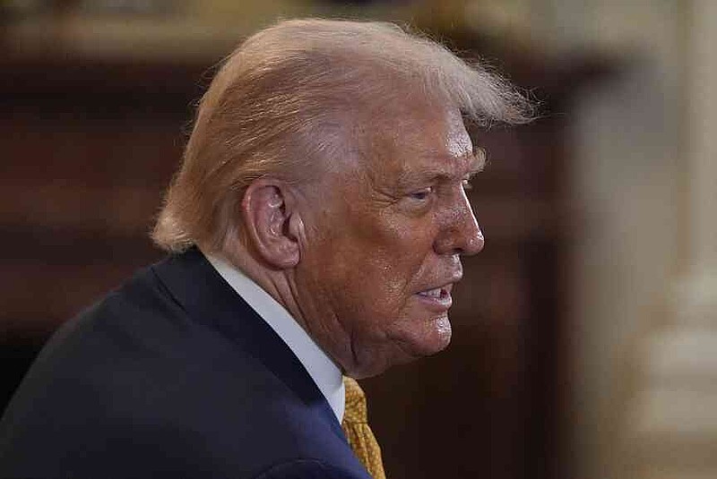 President Donald Trump greets people during a reception for Republican members of Congress in the East Room of the White House, Tuesday, July 22, 2025, in Washington. (AP Photo/Julia Demaree Nikhinson)