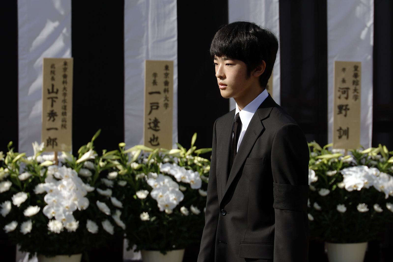 Image may contain Plant Potted Plant Flower Flower Arrangement Adult Person Accessories Formal Wear and Tie
