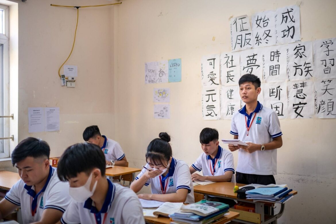 Japan to start new residency system for foreign workers