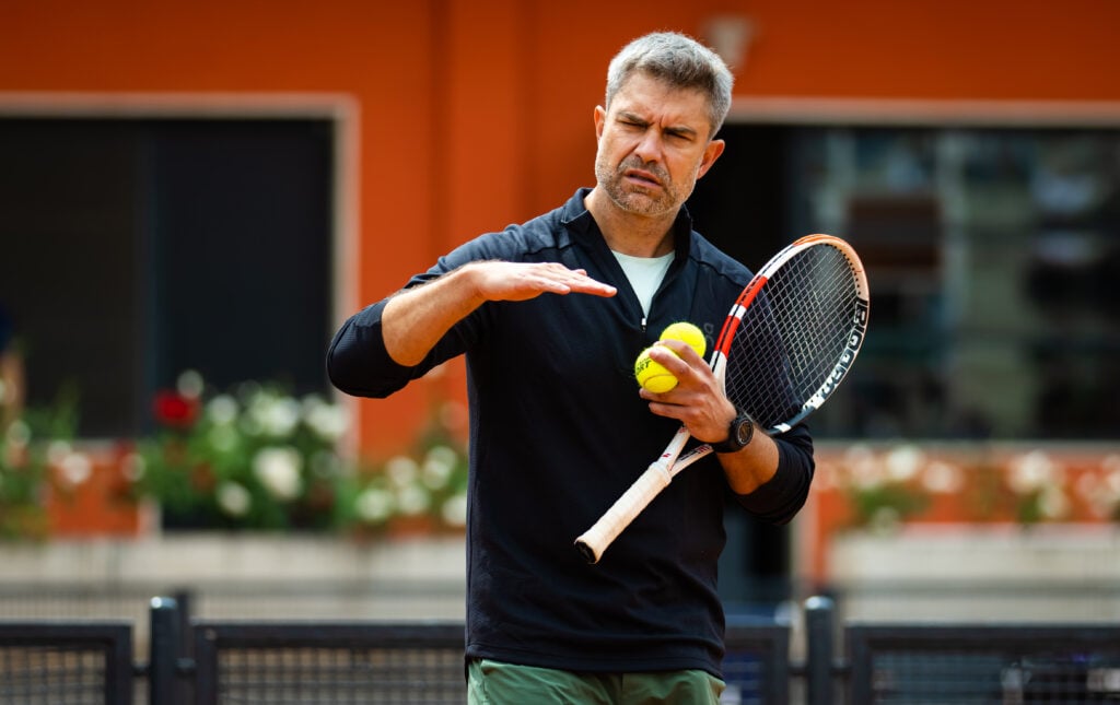 Tomasz Wiktorowski coaches Iga Swiatek at the Internazionali BNL D'Italia in 2023