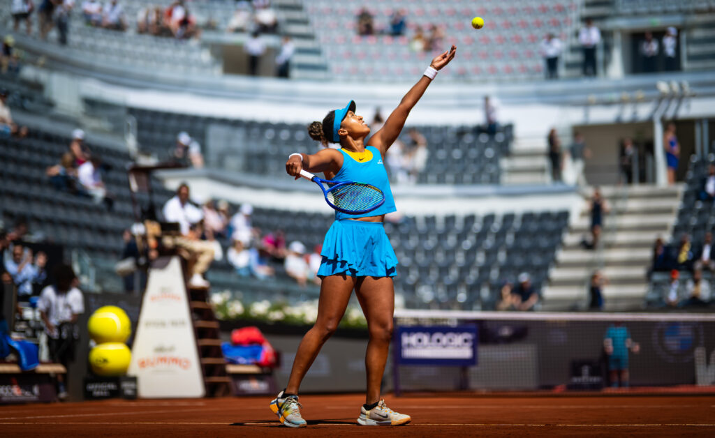 Naomi Osaka hits a serve at the Internazionali BNL D'Italia 2025 - Day Eight
