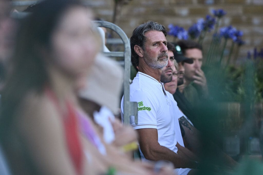 Patrick Mouratoglou looks on during Naomi Osaka's first-round win at Wimbledon in 2025