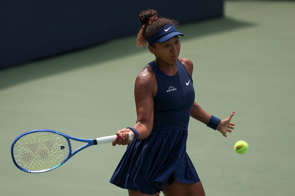 Naomi Osaka hits a forehand against Emma Raducanu at the Mubadala Citi DC Open 2025