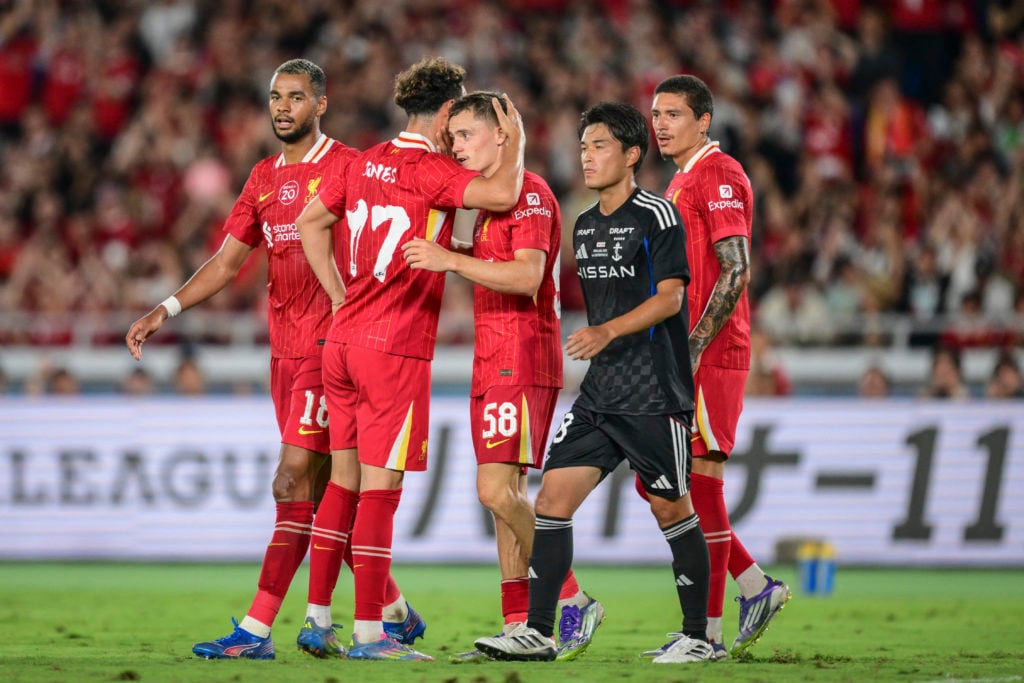 Florian Wirtz celebrates with Curtis Jones after scoring for Liverpool in their pre-season friendly against Yokoham F. Marinos at the Nissan Stadium.