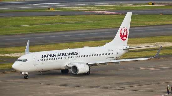 A Boeing Co. 737-846 aircraft operated by Japan Airlines is seen on the tarmac.(Bloomberg File)