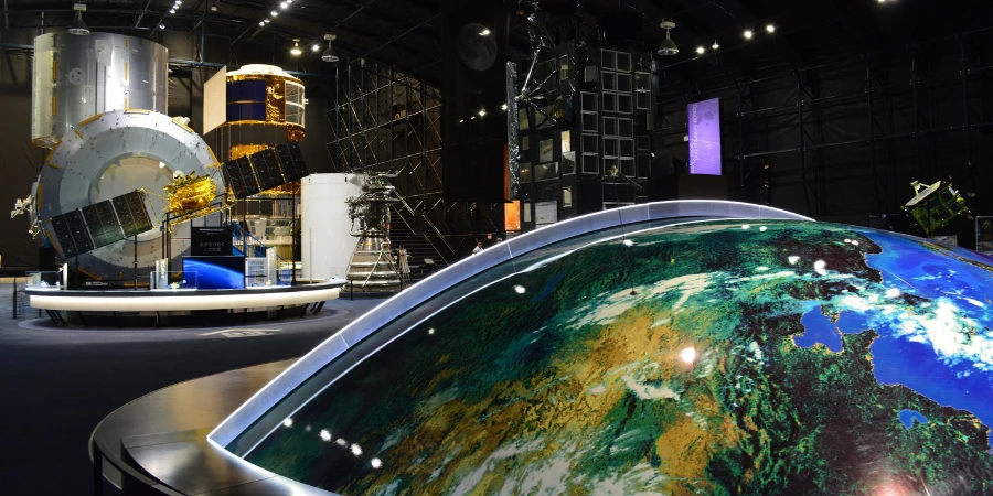 Futuristic displays of the globe and rockets in the JAXA Tsubasa Space Center in Ibaraki