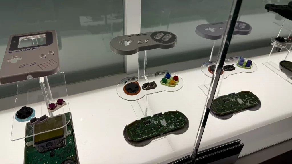 Nintendo Museum Kyoto: Another angle on Nintendo controllers and game systems, exploded view. (Photo: Alex Kidman)