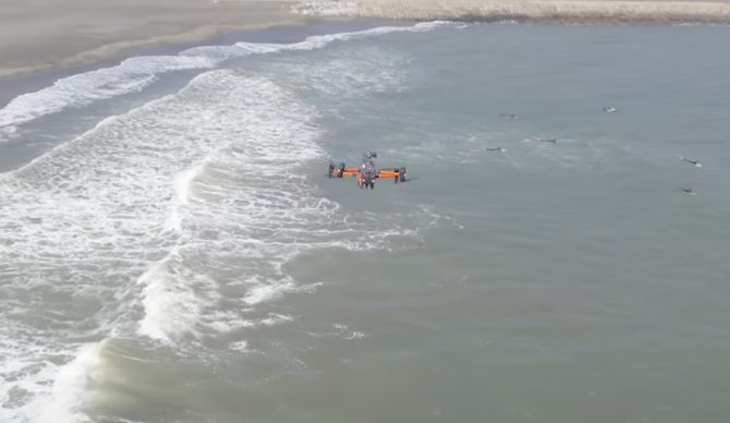 A drone patrols the beach in a test run of the new system. Photo: Blue Innovation Co. // YouTube