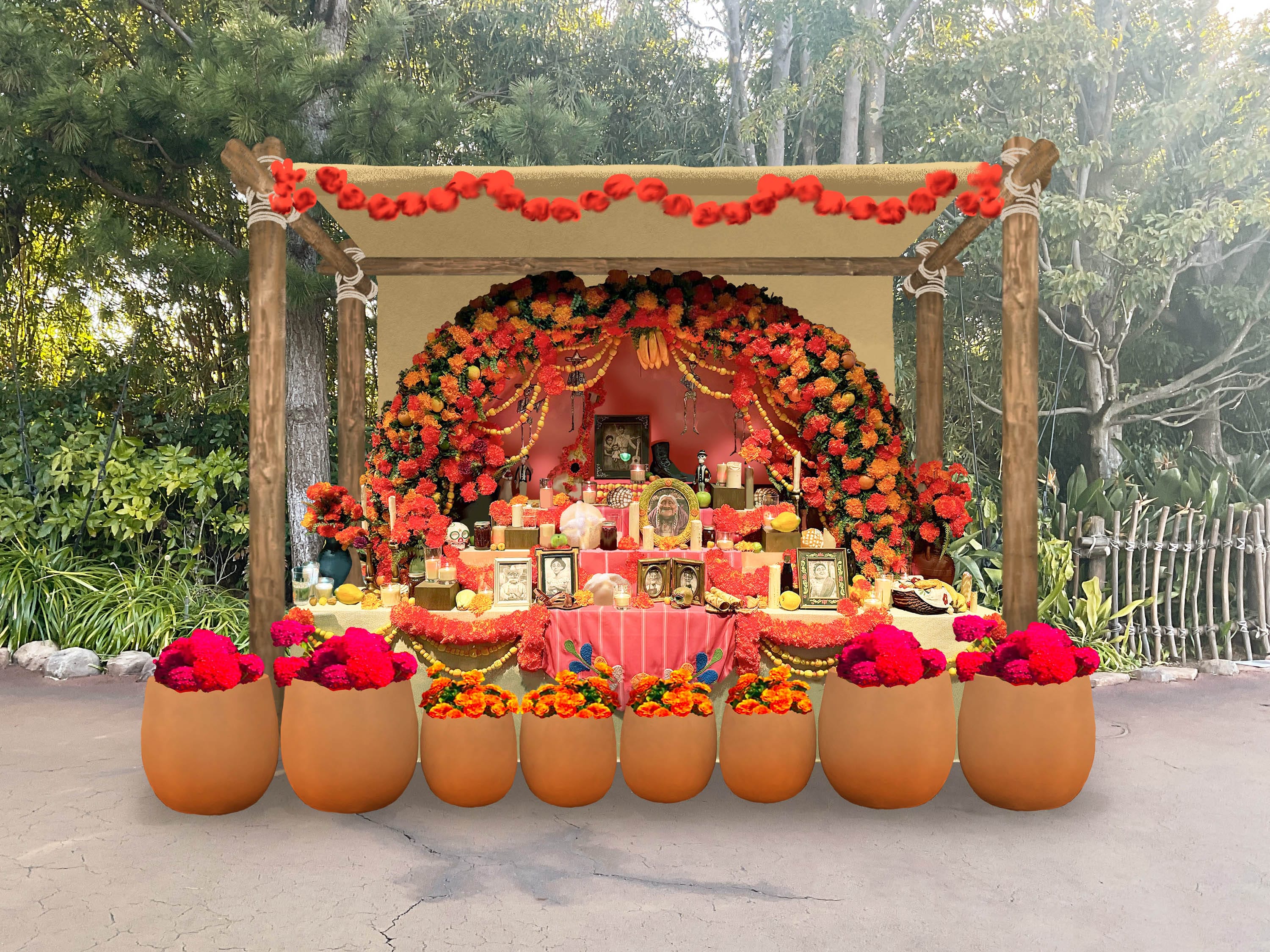 Day of the Dead altar with flowers and candles, surrounded by trees—like Halloween at Tokyo Disney Resort.