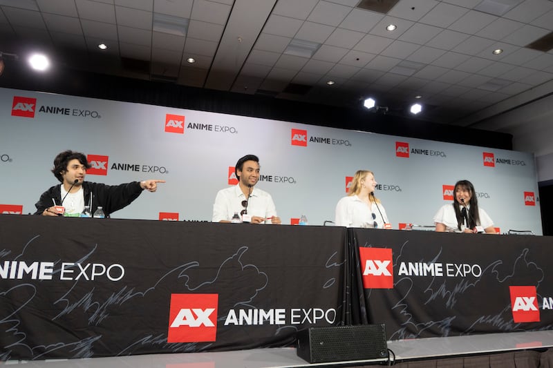 Panelist pointing at the crowd