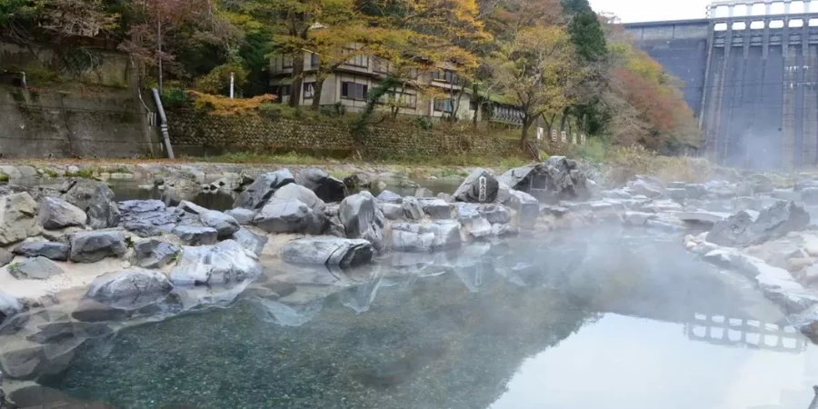 Steam emerging from wild open-air onsen in Okayama
