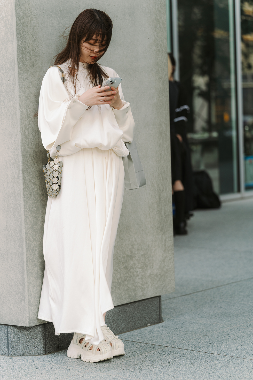 tokyo, japan september 07: a guest is seen wearing white maxi dress, white shoes, bag during rakuten tokyo fashion week s/s 2025 on september 07, 2024 in tokyo, japan. (photo by mila gruber/getty images)