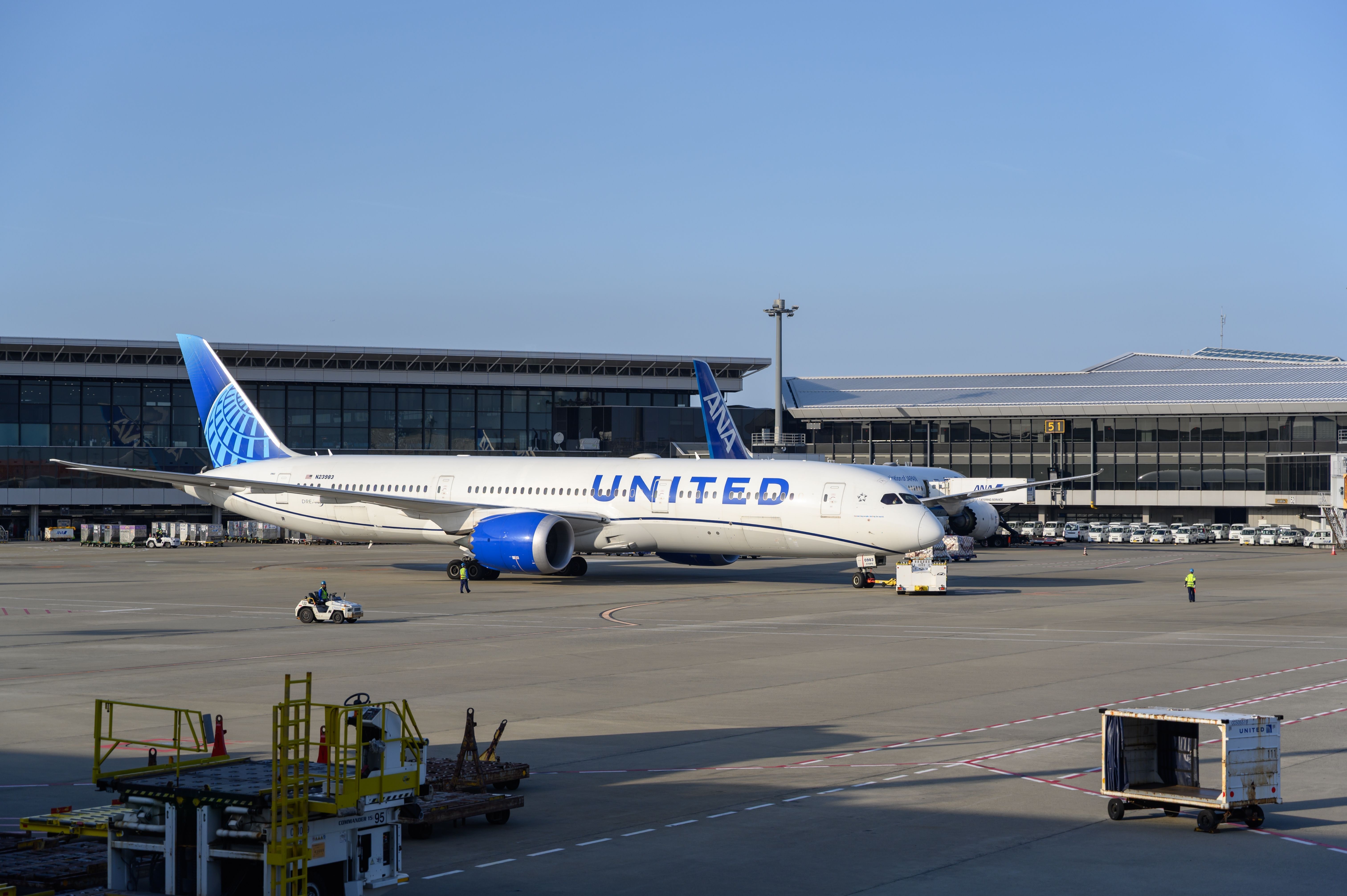 April 9, 2025 - United Airlines aircraft parked at passenger gate at Narita International Airport (NRT), Tokyo