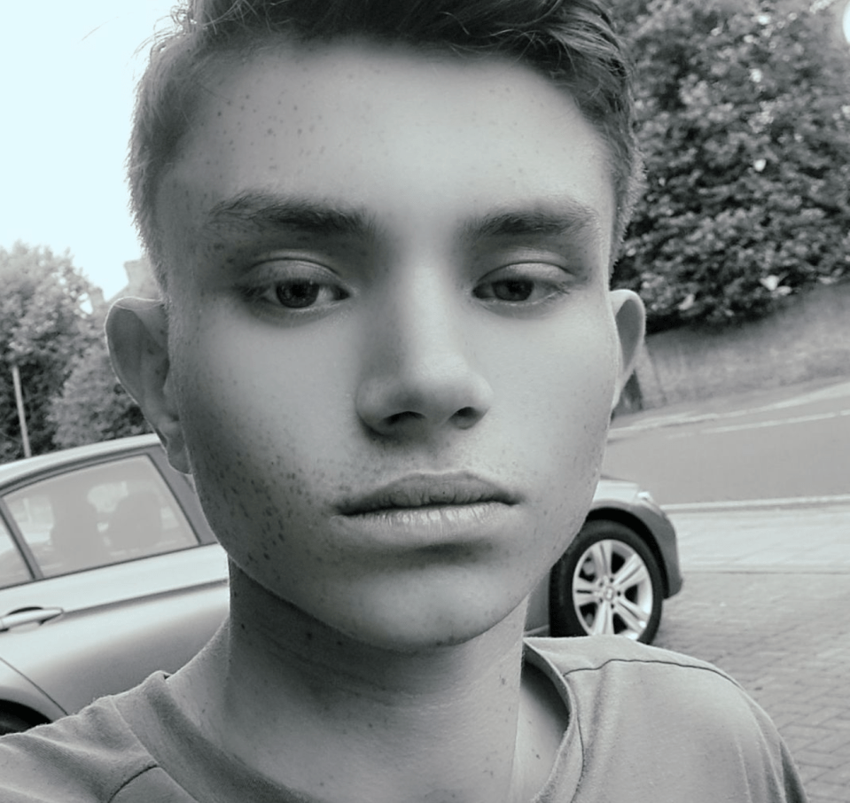Black and white photo of Sean Stephenson, an autistic teenager.