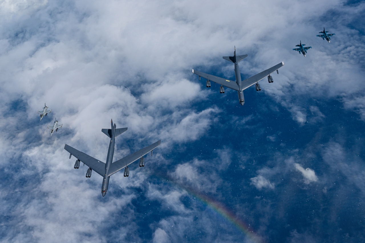 A formation of aircraft from South Korea, the United States, and Japan flies over international waters south of Jeju Island during joint air drills Friday. (South Korean Defense Ministry)