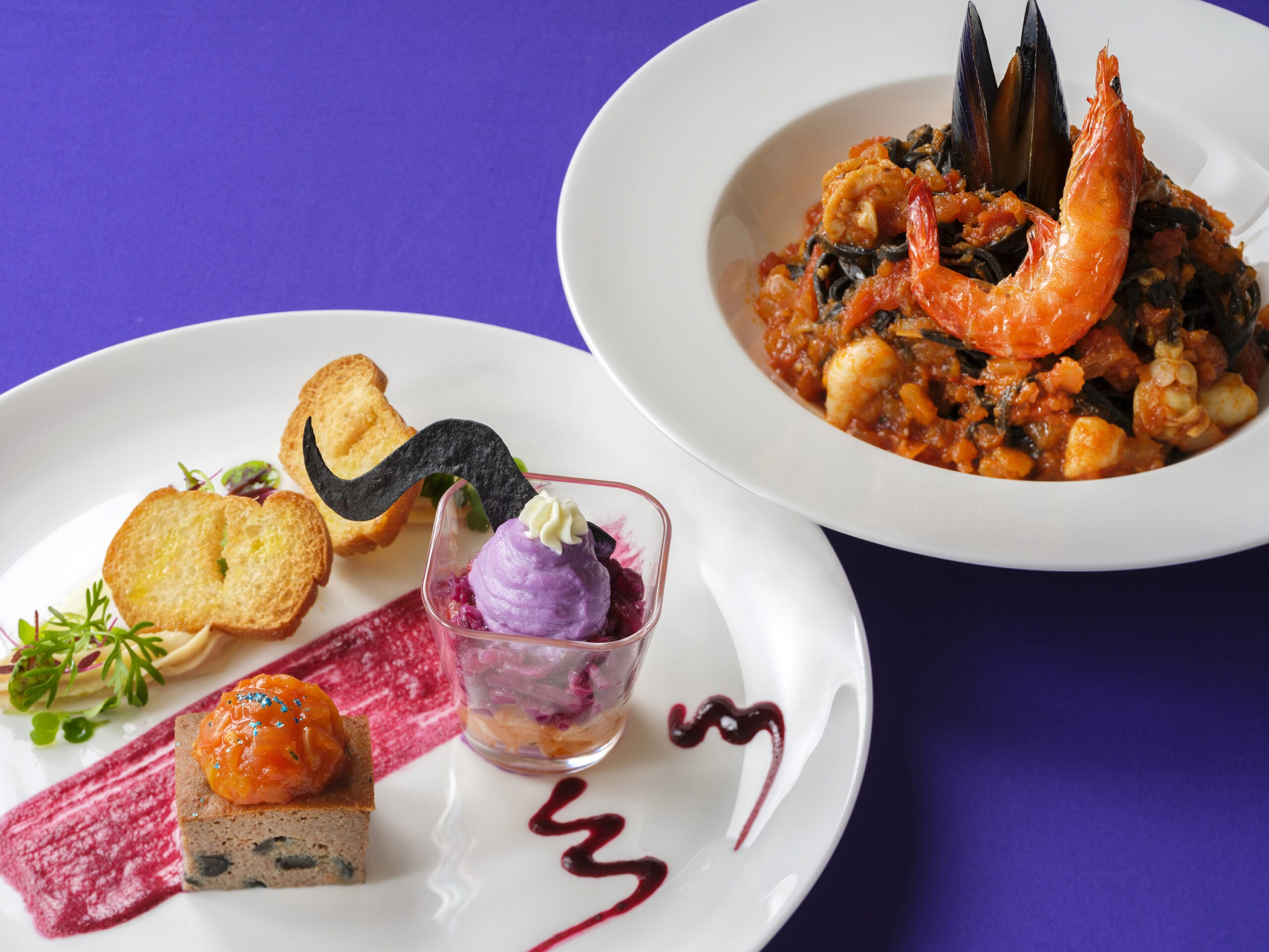 A gourmet seafood pasta and artful dessert, inspired by Tokyo Disney Resort, on a vibrant purple background.