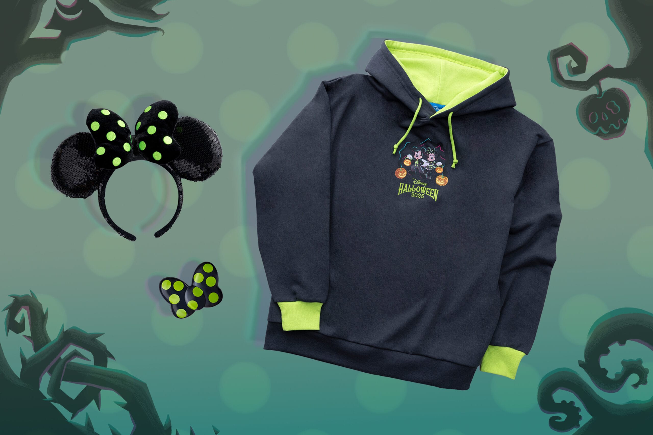 Black hoodie with Halloween design, Tokyo Disney Resort mouse ears headband, and bow on a spooky background.