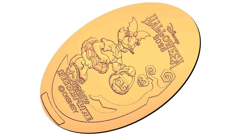 A gold Disney Halloween 2023 coin features Daisy Duck with a pumpkin bucket at Tokyo Disney Resort.