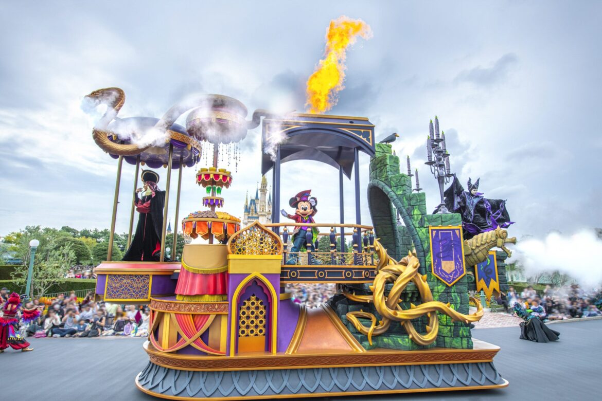 Tokyo Disney Resort Announces Halloween 2025 Dates & Details, Plus New ‘Coco’ Day of the Dead Event Halloween parade float with Disney villains, fire effects, and castle at Tokyo Disney Resort theme park.