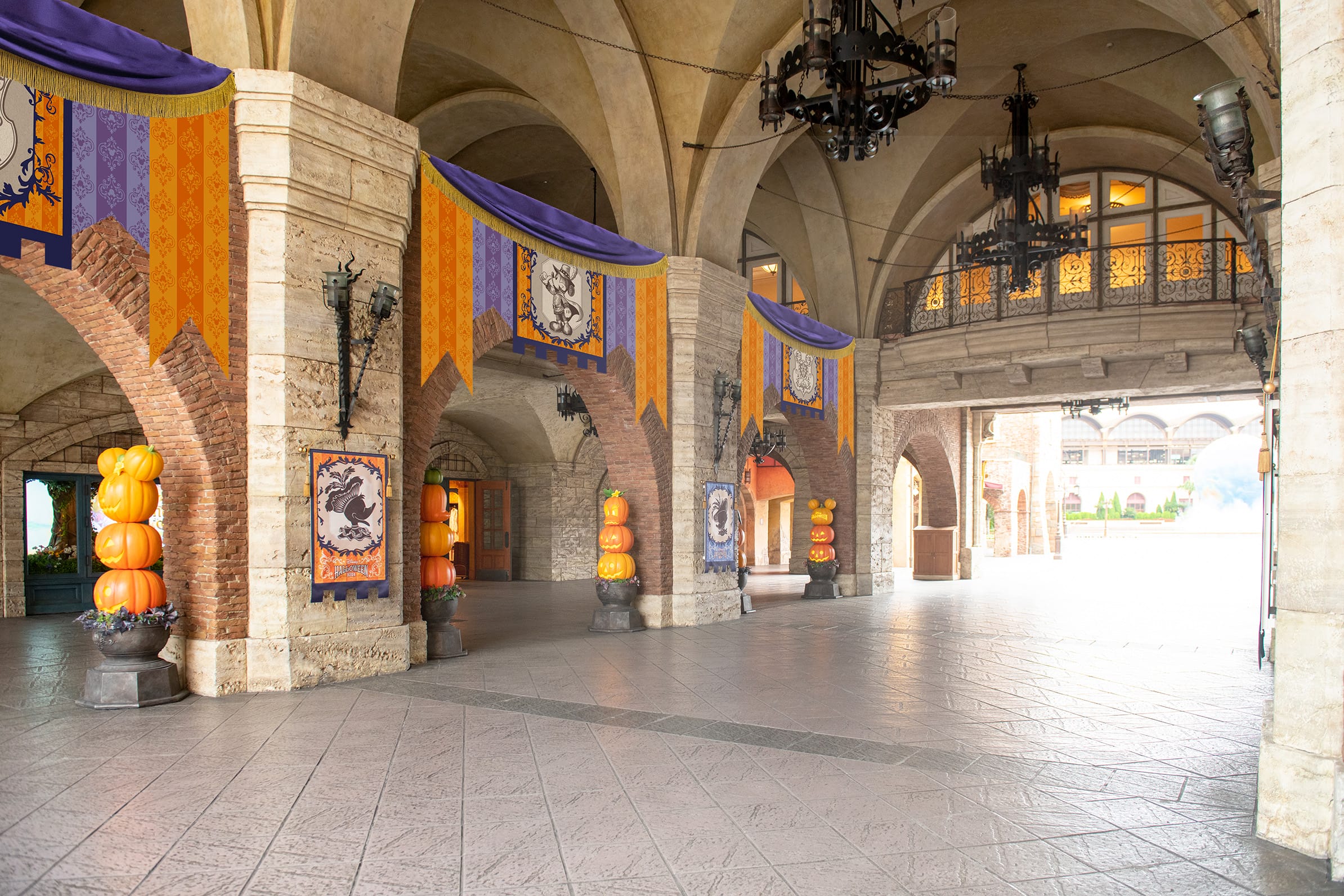Stone archway with Halloween 2025 banners and stacked pumpkins at Tokyo Disney Resort, lanterns hanging above.