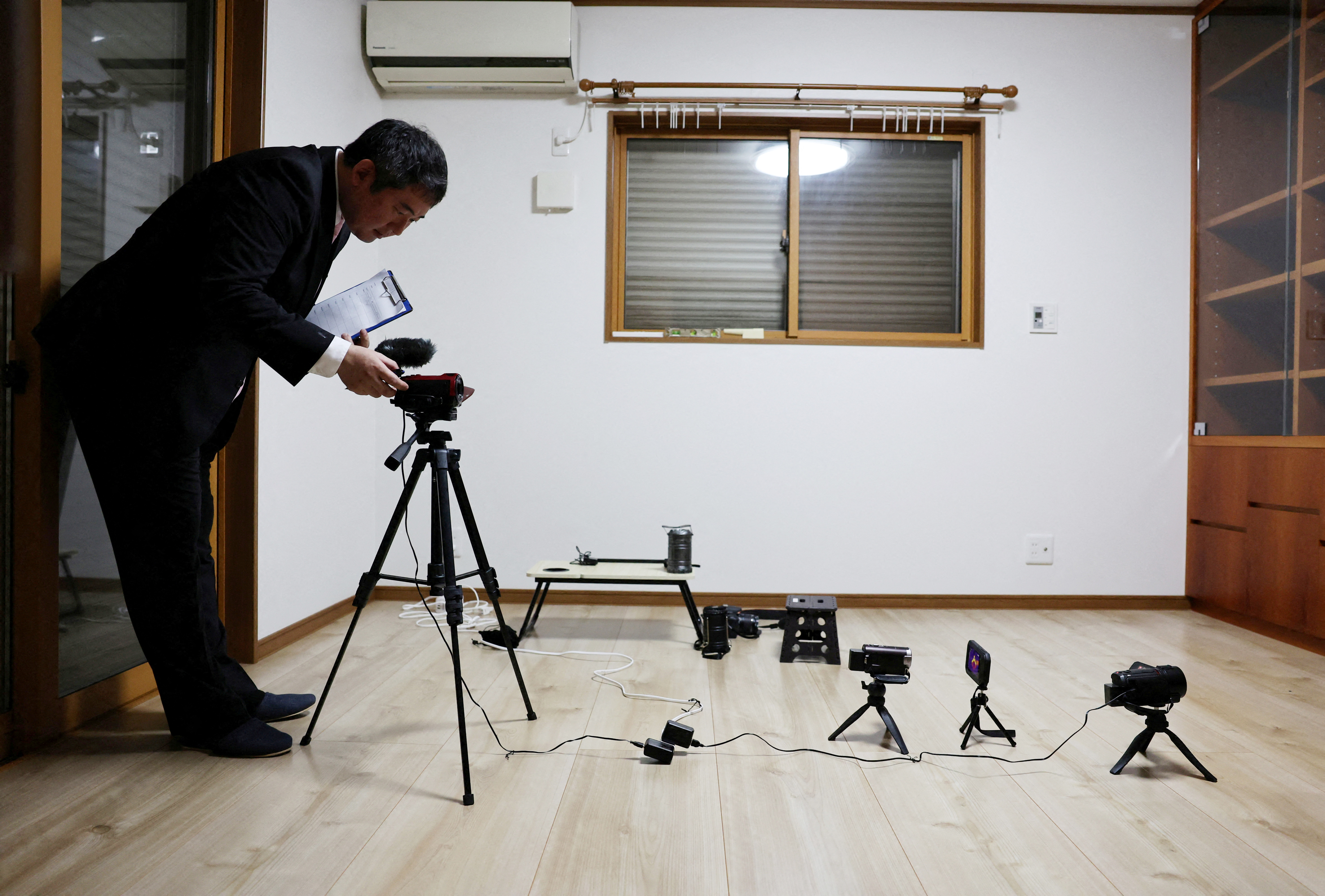 A real estate consultant conducts a ghost investigation in a house.