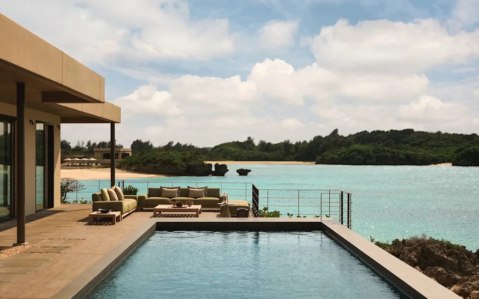 The hotel feels almost surrounded by the crystalline waters of Miyakojima