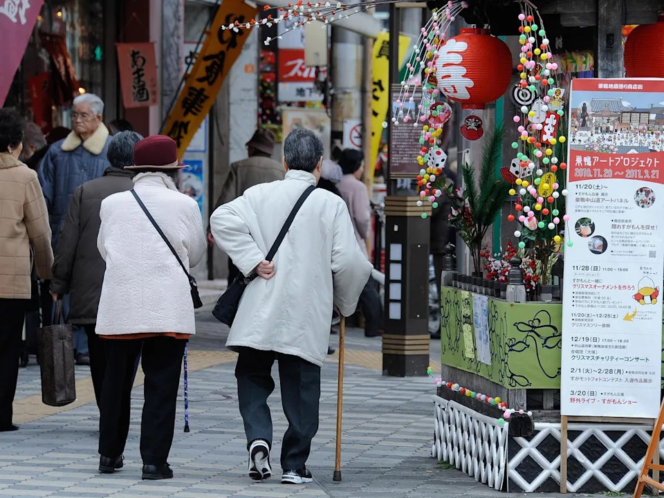 File. Elderly people walk in the street at Kouganji Temple in Tokyo (AFP/Getty)