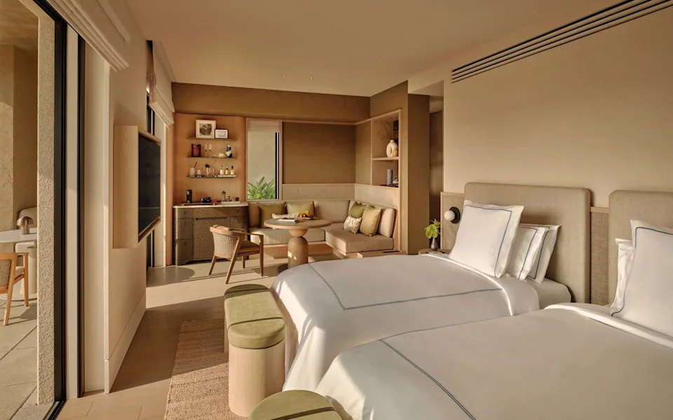 Rooms are decorated with wood, leather and stone