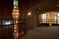 Chandeliers are seen in the entrance hall, right, and above stairs at the Matsumoto Memorial Music Guest House in Tokyo's Setagaya Ward, April 17, 2023. (Mainichi/Akihiro Ogomori)
