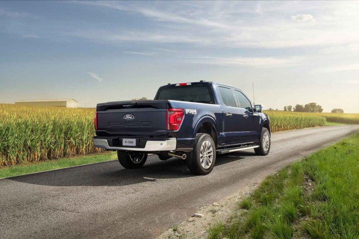 A photo showing the exterior of a 2024 Ford F-150 from a rear three quarters angle.