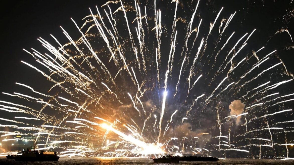 Barges carrying fireworks ablaze in Japan, five flee into sea