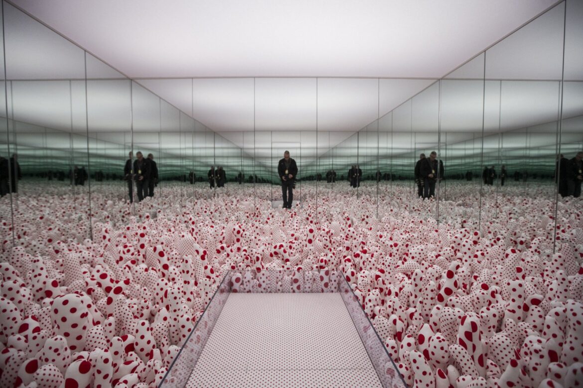 Louis Vuitton Osaka hosts Yayoi Kusama artworks TORONTO, ON - FEBRUARY 27 - Photographer Bernard Weil is reflected inside the Infinity Mirror Room - Phalli