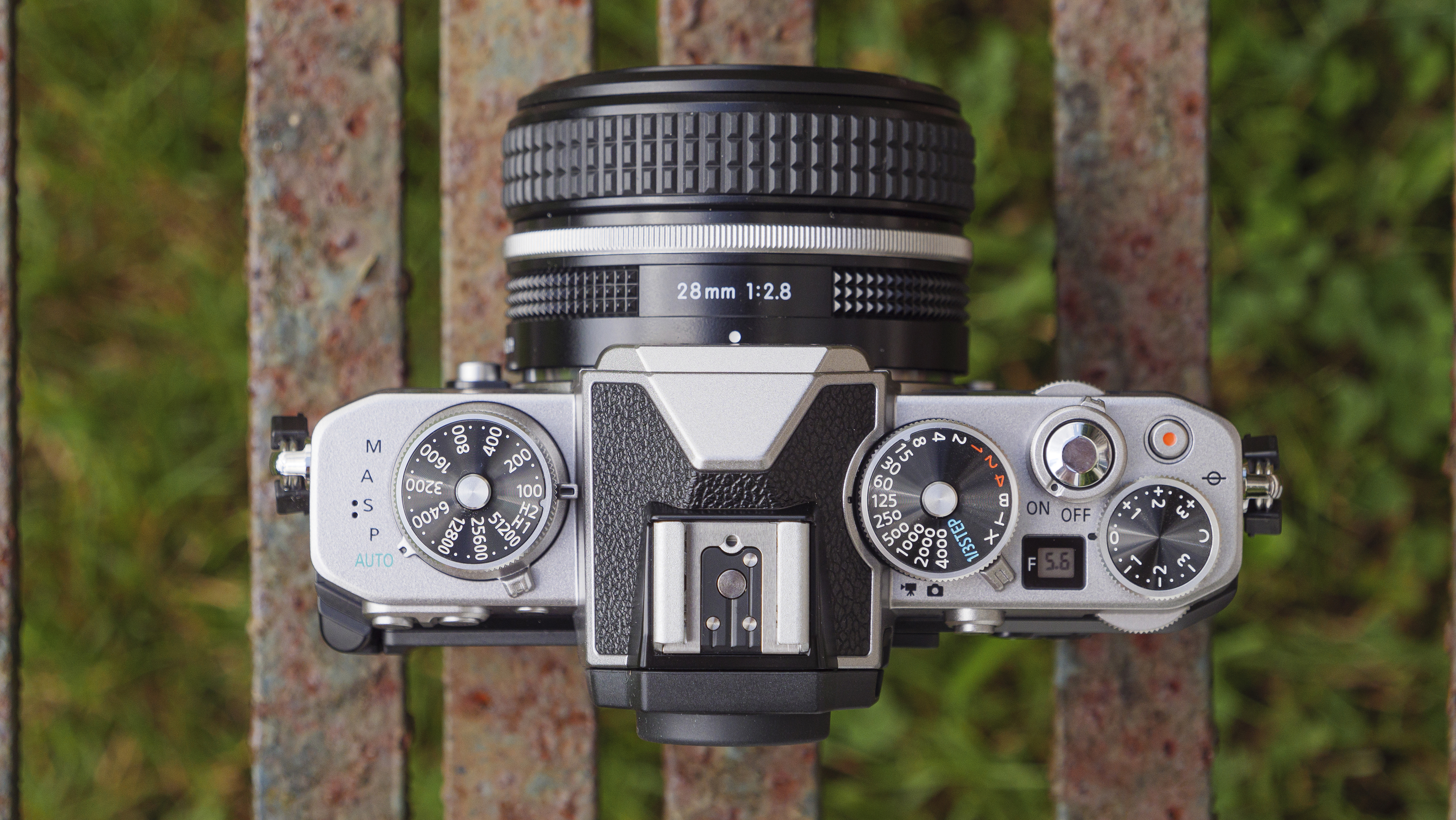 The Nikon Z fc camera on a park bench